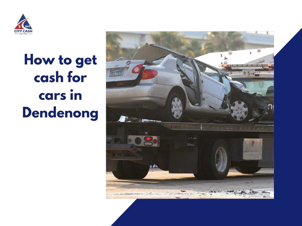 Severely damaged sedan loaded onto a tow truck for free car removal in Melbourne