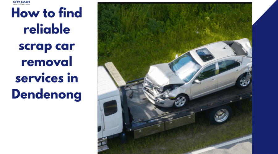 Damaged car being loaded onto a tow truck for free car removal in dendenog