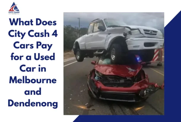 Damaged red car crushed under a white pickup truck after a road accident, illustrating free car removal and towing services.