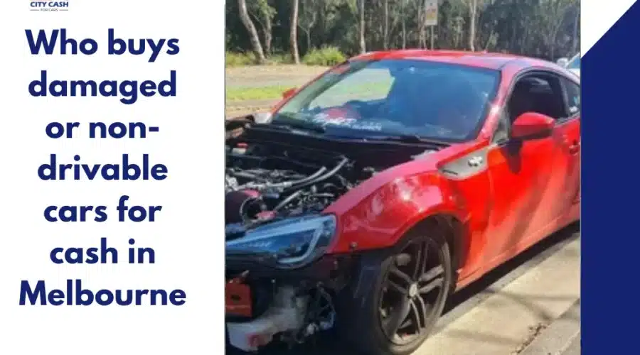 Red damaged sports coupe with missing front bumper and exposed engine parked roadside.