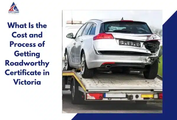 Damaged white station wagon being transported on a tow truck, alongside text about the cost and process of obtaining a roadworthy certificate in Victoria.